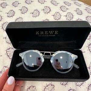 Krewe sunglasses limited edition; reflective lens, gently used. See images.